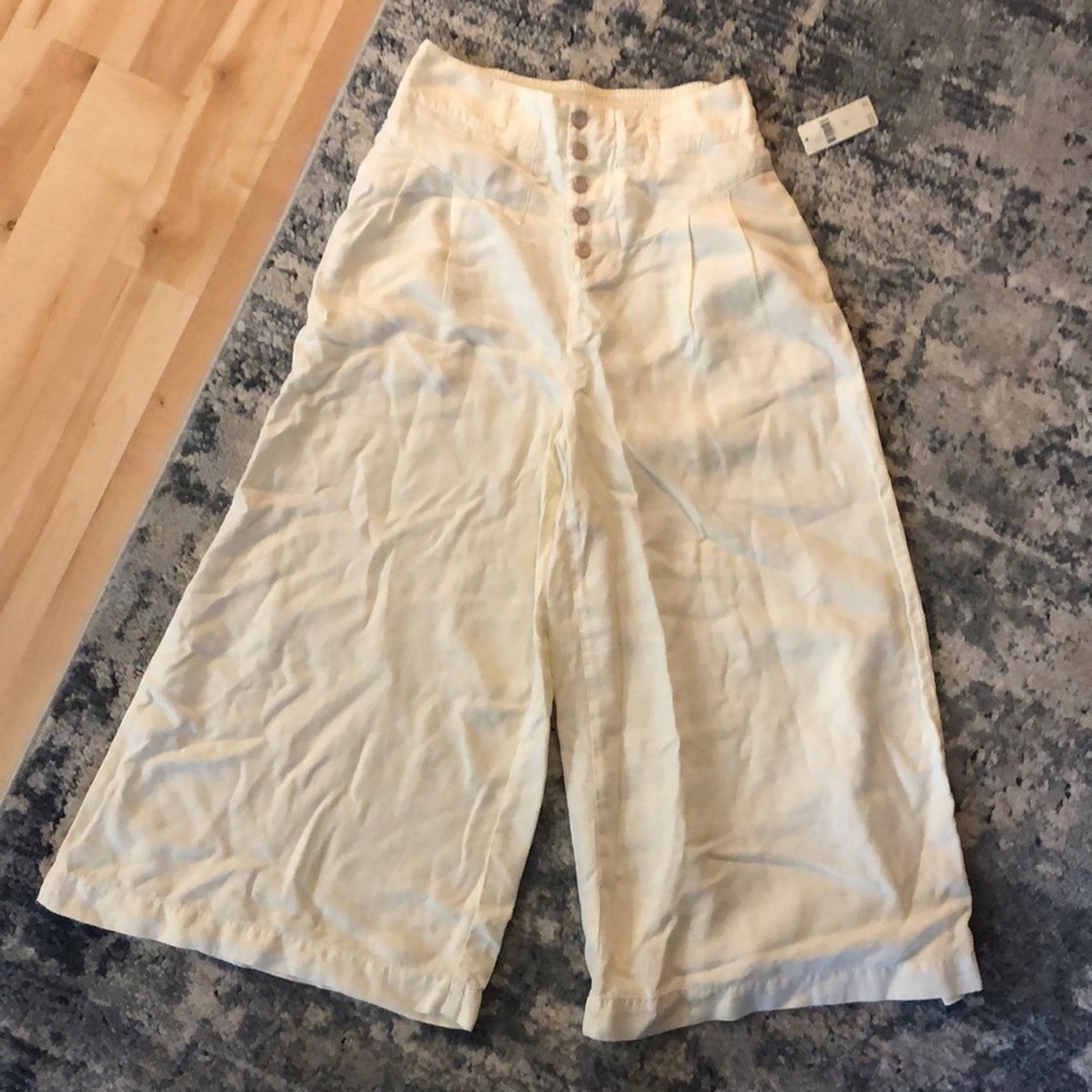 Ivory pleated wide leg cropped pants
